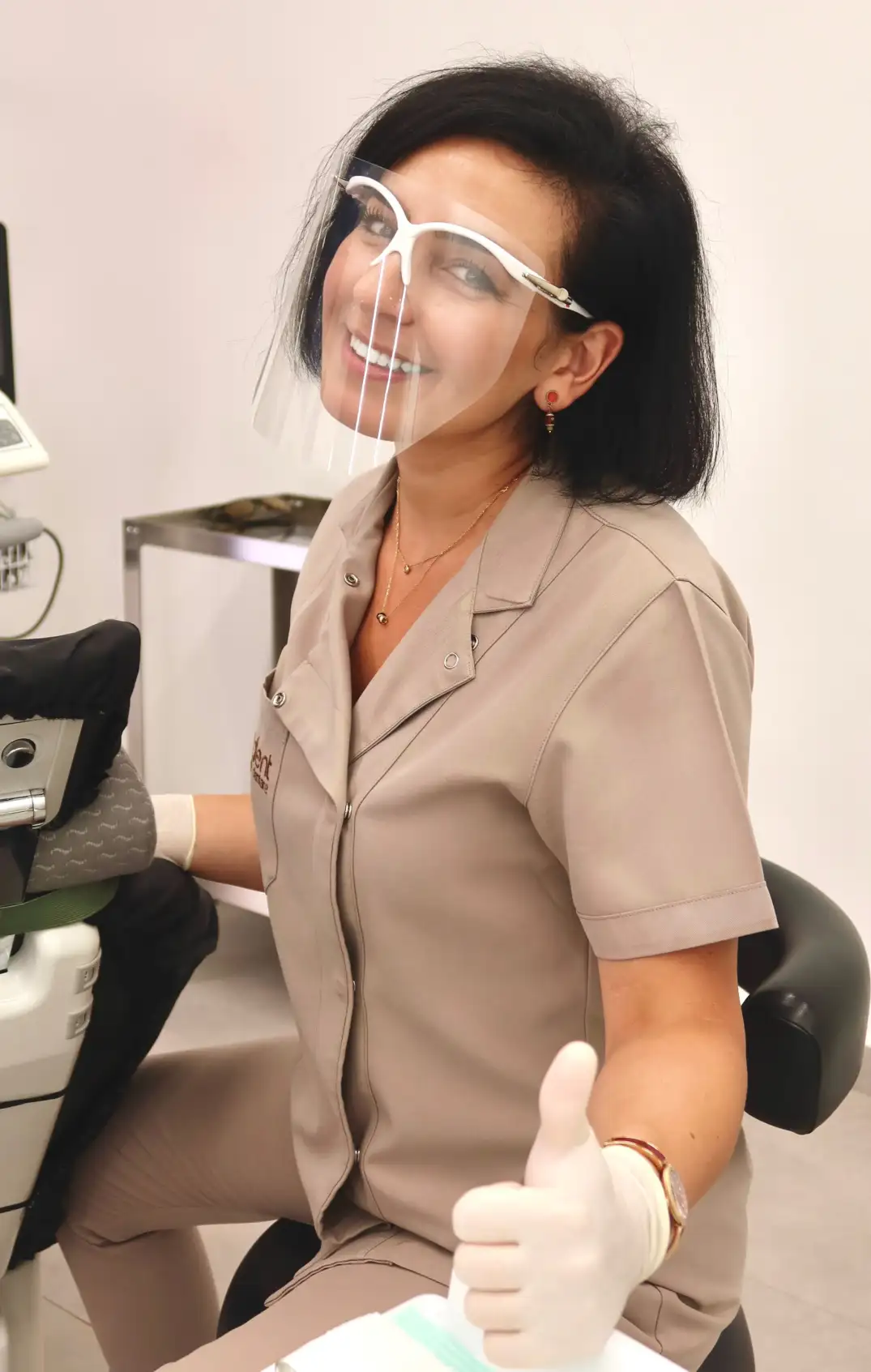 Dr. Anduela Curmaku - Dental Implants and Veneers Specialist at Andent Clinic Tirana Albania